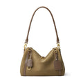 Large-capacity cowhide hobo bag in apricot, front view with adjustable strap