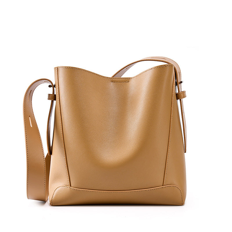 Minimalist Cowhide Bucket Tote with Long Strap - product image 1