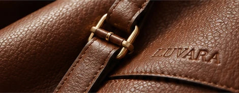 Brown leather grain, stitched strap and LUVARA embossed detail